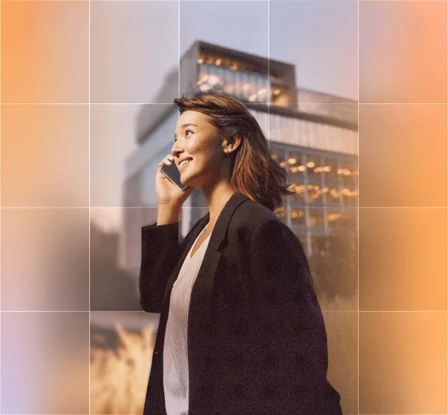 A professional woman smiling during a seamless AI-powered voice call.