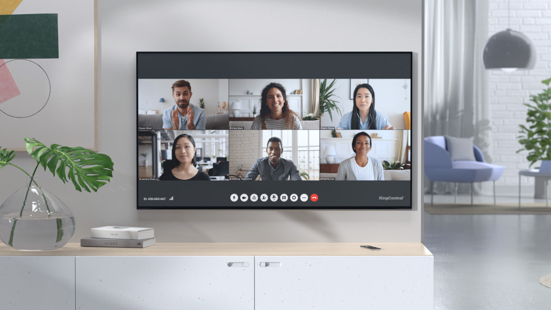 Manager working from home having a group video meeting with remote staff via RingCentral