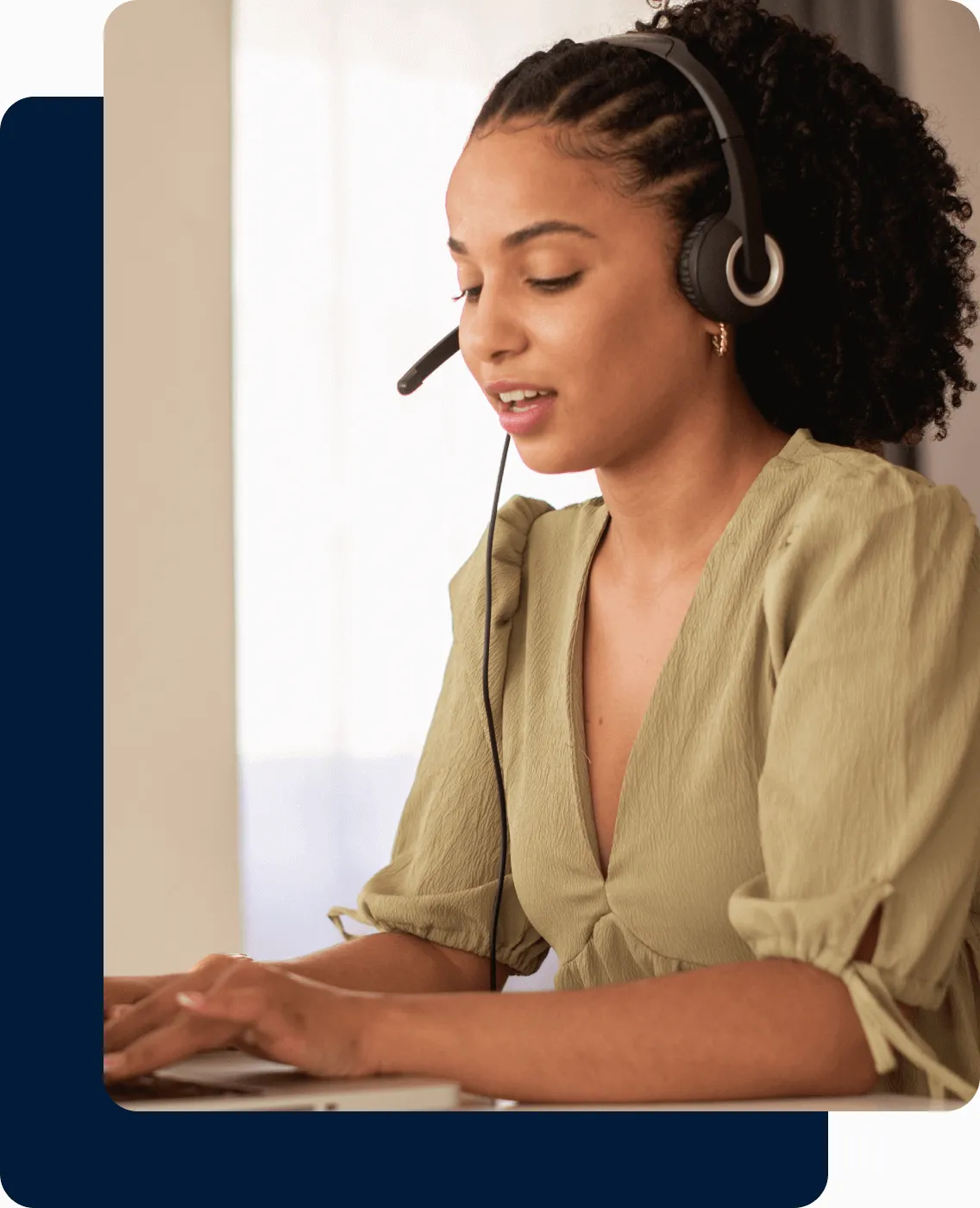 A woman receiving a phone call using a headset