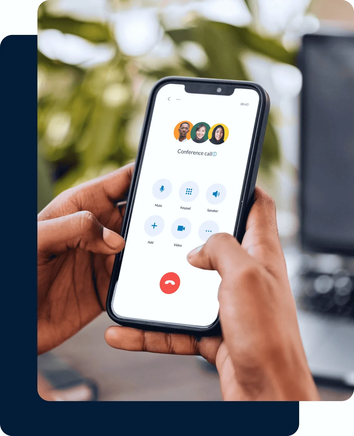 hands holding a mobile phone while engaged in an audio conference call via the RingCentral app