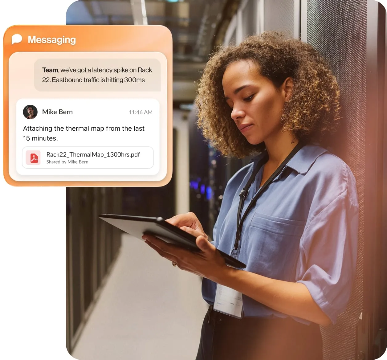 A female worker at a data center is messaging on her tablet device.