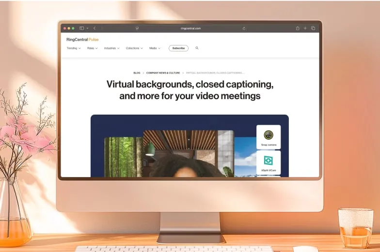 Blog on virtual backgrounds, closed captioning, and more for your video meetings, shown on an iMac.