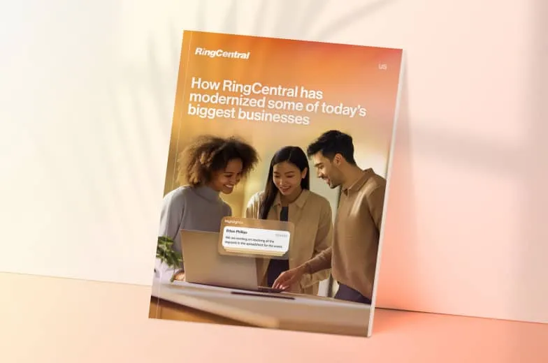 A view of a RingCentral report titled 'How RingCentral has modernized some of today's biggest businesses,' featuring three diverse individuals collaborating around a laptop.