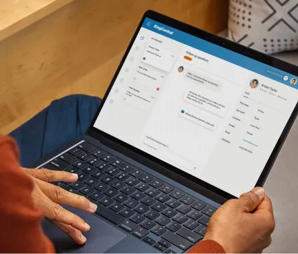 A laptop screen atop a woman's lap showing the RingCentral app